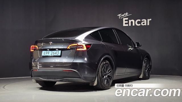 Tesla Model Y RWD — пробег 40 030 км — фото 2 из 5