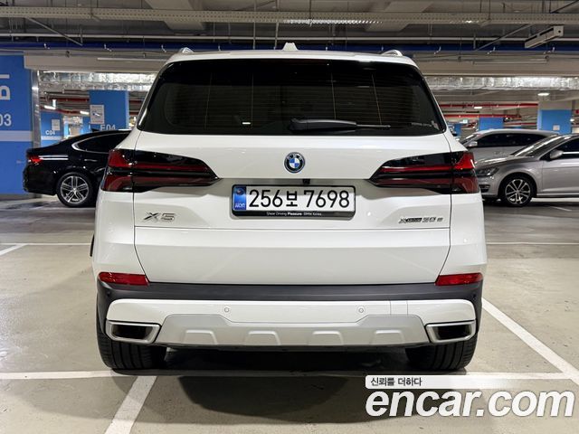 BMW X5 xDrive 50e xLine — пробег 14 028 км — фото 4 из 5