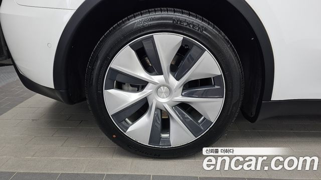 Tesla Model Y Long Range AWD — пробег 98 499 км — фото 5 из 5
