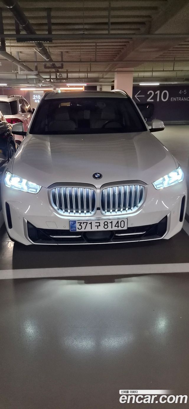 BMW X5 xDrive 50e xLine — пробег 7 062 км — фото 5 из 5