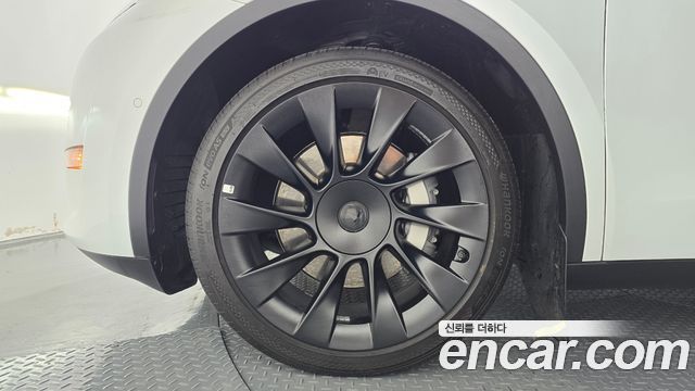 Tesla Model Y Long Range AWD — пробег 67 340 км — фото 5 из 5