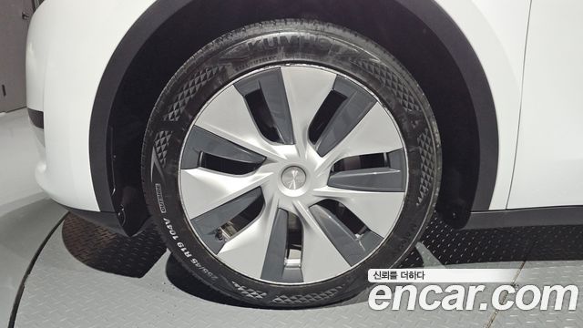 Tesla Model Y RWD — пробег 62 738 км — фото 5 из 5