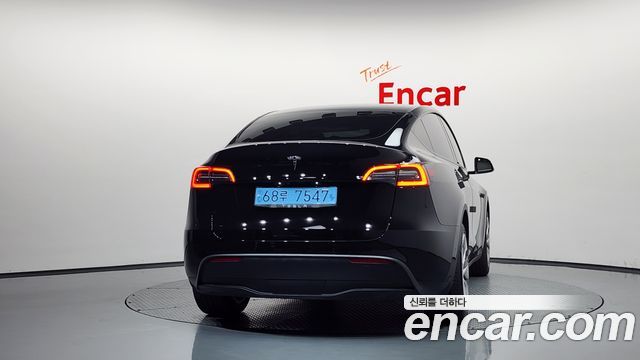 Tesla Model Y Standard Range RWD — пробег 80 869 км — фото 4 из 5
