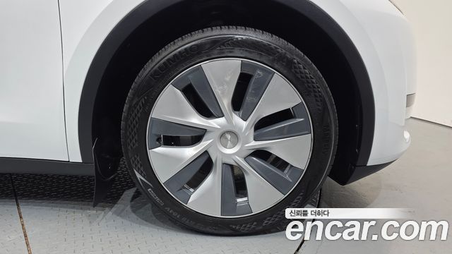 Tesla Model Y RWD — пробег 33 309 км — фото 5 из 5