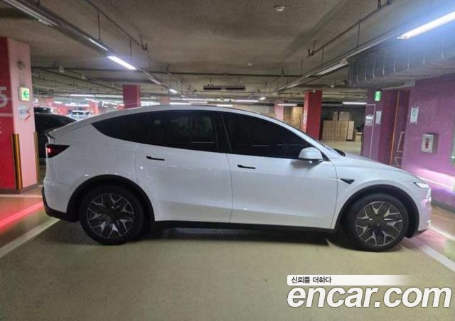 Tesla Model Y L Long Range AWD — пробег 1 км — фото 5 из 5