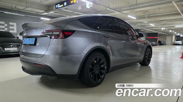 Tesla Model Y Long Range AWD — пробег 56 400 км — фото 2 из 5