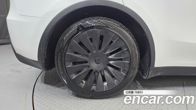 Tesla Model Y RWD — пробег 48 313 км — фото 5 из 5