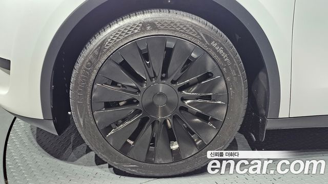 Tesla Model Y RWD — пробег 43 050 км — фото 5 из 5