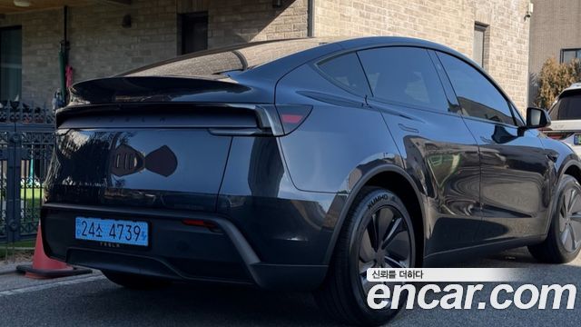Tesla Model Y Premium RWD — пробег 1 200 км — фото 2 из 5