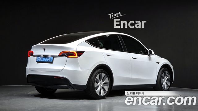 Tesla Model Y RWD — пробег 29 555 км — фото 2 из 5