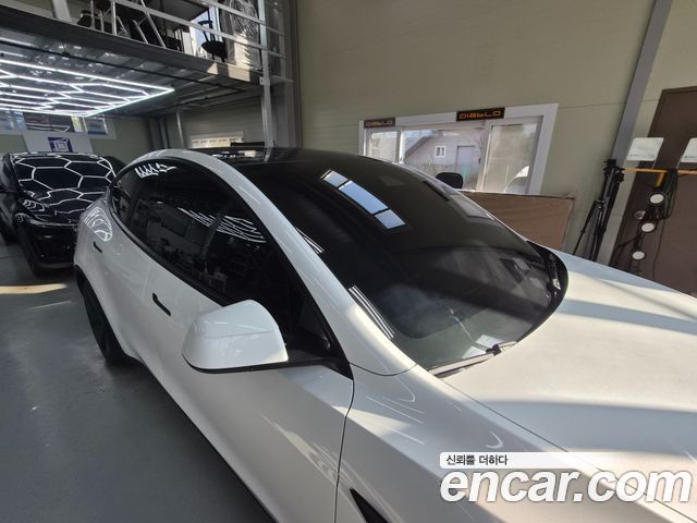 Tesla Model Y RWD — пробег 2 631 км — фото 3 из 5