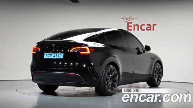 Tesla Model Y RWD — пробег 34 707 км — фото 2 из 5
