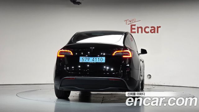Tesla Model Y RWD — пробег 34 707 км — фото 4 из 5