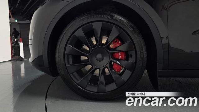 Tesla Model Y RWD — пробег 34 707 км — фото 5 из 5