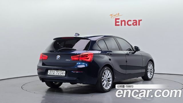 BMW 1-Series 118d Sport 5Door — пробег 244 279 км — фото 2 из 5