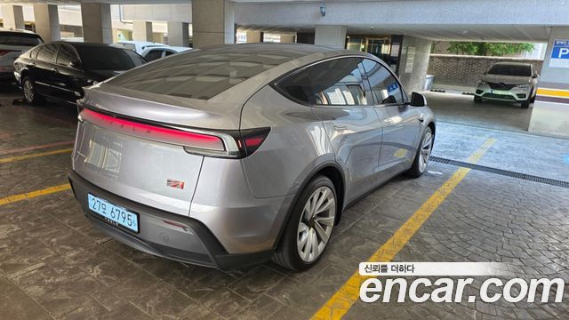 Tesla Model Y Long Range Launch Edition AWD — пробег 18 000 км — фото 2 из 5