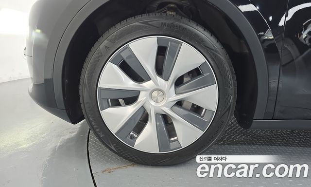 Tesla Model Y RWD — пробег 43 127 км — фото 5 из 5