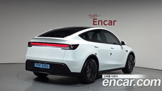 Tesla Model Y RWD — пробег 25 677 км — фото 2 из 5