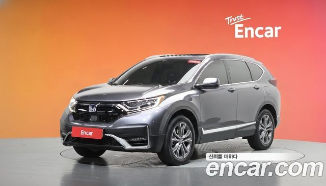 Honda CR-V 2.0 Hybrid Touring 4WD — пробег 61 316 км — фото 1 из 5