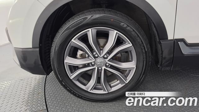 Honda CR-V 2.0 Hybrid Touring 4WD — пробег 136 348 км