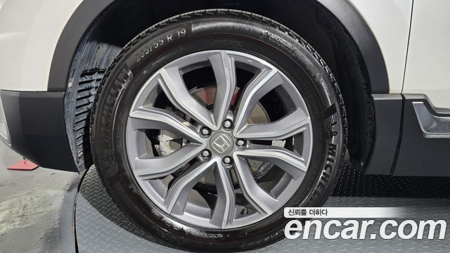 Honda CR-V 2.0 Hybrid Touring 4WD — пробег 110 325 км