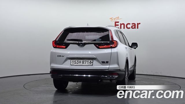 Honda CR-V 2.0 Hybrid Touring 4WD — пробег 37 918 км — фото 4 из 5