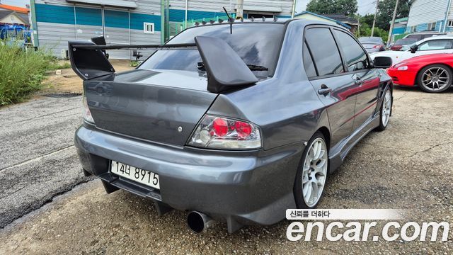 Mitsubishi Lancer Evolution 8th — пробег 130 000 км — фото 2 из 5