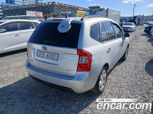 Kia Carens LPI 2.0 GLX Deluxe — пробег 295 948 км — фото 5 из 5