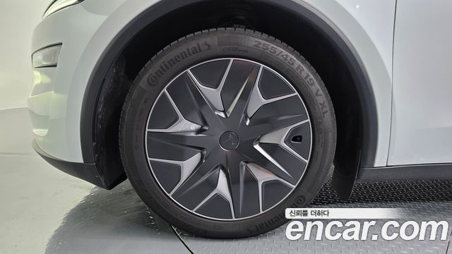 Tesla Model Y L Long Range AWD — пробег 4 998 км — фото 5 из 5