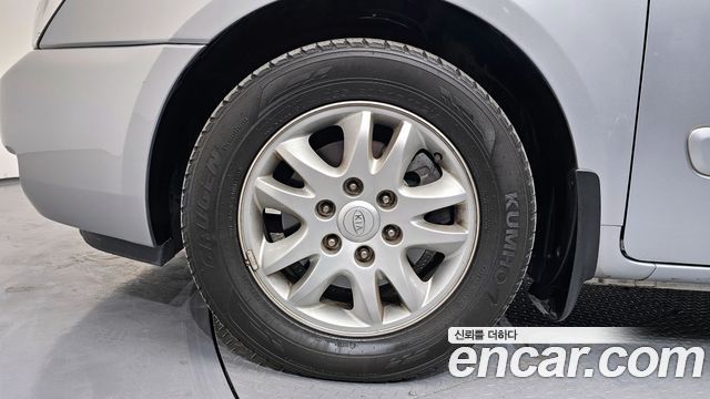 Kia Carnival GLX — пробег 119 978 км — фото 5 из 5
