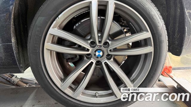 BMW 7-Series 740Li xDrive M Sport Package — пробег 117 000 км — фото 5 из 5