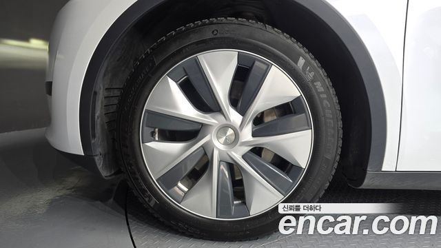 Tesla Model Y RWD — пробег 157 838 км — фото 5 из 5
