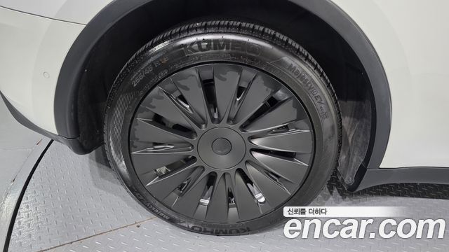 Tesla Model Y Long Range AWD — пробег 128 388 км — фото 5 из 5